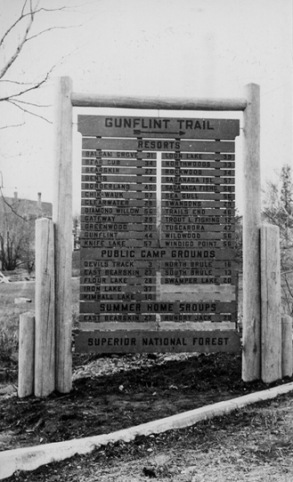 The entrance sign to the Gunflint Trail. Photographed on May 11, 1939, by the United States Department of Agriculture, Forest Service Region 9. Public domain.