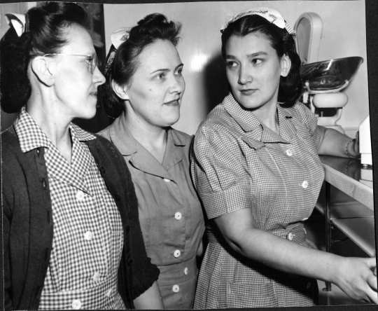 Photograph of three Egekvist Bakery store clerks, 1947.