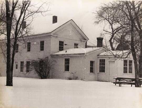 Black and white photograph of the north face of the Banfill Tavern/Locke House, 1978.