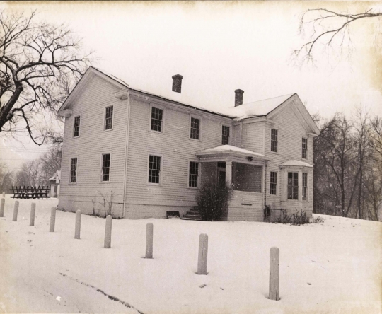 Black and white photograph of the southeast face of the Banfill Tavern–Locke House, 1978.