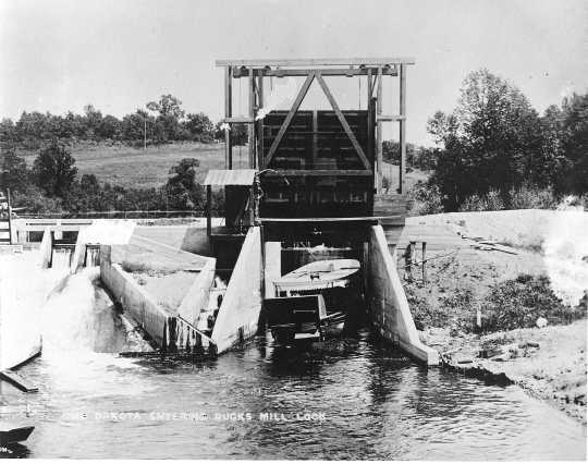 photograph of a steamboat going through a lock on the Pelican River