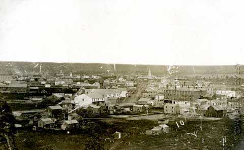 Black and white photograph of Winslow Hotel and Seven Corners, 1861.