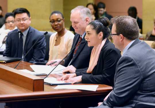 Color image of MCLA staff member Violeta Hernández Espinosa testifies during the SF1585 hearing, 2017. Used with the permission of the Minnesota Council on Latino Affairs.