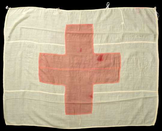 Color image of a Red Cross Flag carried by Theresa Ericksen to the Philippines during the Spanish–American War and to France during World War I.