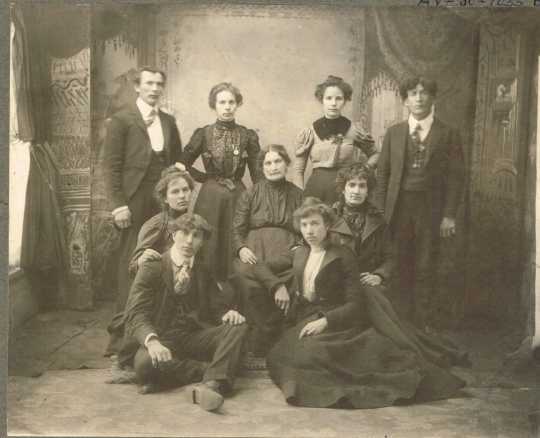 Black and white photograph of Mrs. Schmitt and family, c.1895.