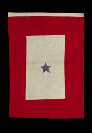 Color image of a red and white felt service flag with one blue star, used by the family of Harvey Mears, who served in World War I and World War II, ca. 1915–1943.