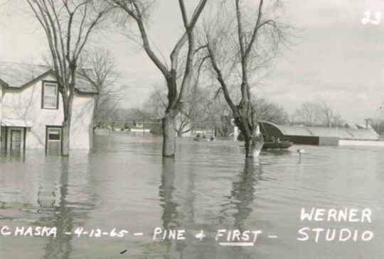 Black and white photograph of Pine and First Streets, Chaska