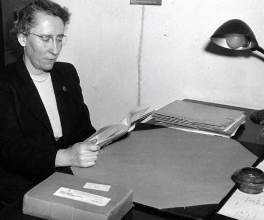 Black and white photograph of Agnes Keenan in her office, c.1950. From the Agnes Keenan Collection. St. Catherine University Archives, St. Paul. 