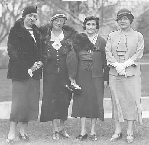 Black and white photograph of members of the St. Paul section of the National Council of Jewish Women, 1933. Pictured are Mrs. Segal, Mrs. Firestone, Mrs. Bronstein, and Mrs. Phillips. 