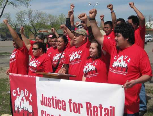 Members of the Centro de Trabajadores Unidos en la Lucha (Center of Workers United in Struggle, CTUL) rally to support retail cleaning workers and their legal fight to collect unpaid wages from big-box employers like Target and K-Mart, 2014. Used with the permission of CTUL; photographer unknown.