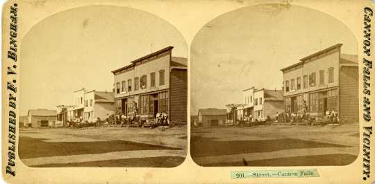 Stereoscopic card of business buildings in Cannon Falls, c. 1880s.