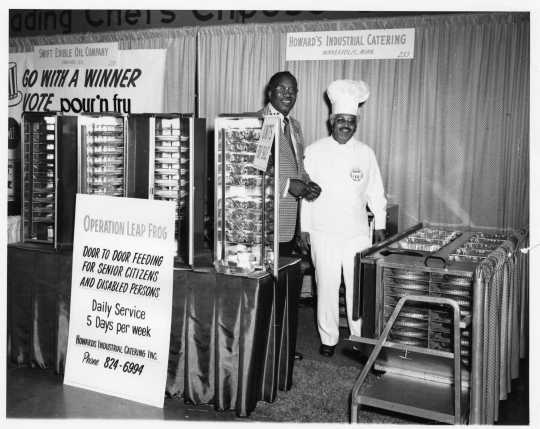 Restaurant trade-show booth for Howard’s Industrial Catering, displaying patented heated food carriers and advertising the Operation Leap Frog feeding program, ca. 1960s. Oscar C. Howard papers, 1945–1990, Cafeteria and Industrial Catering Business, Manuscripts Collection, Minnesota Historical Society.