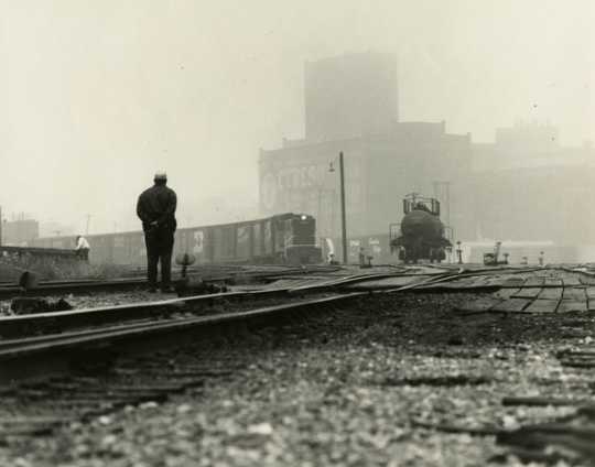 Black and white photograph of the Washington Avenue viaduct, Milwaukee Road depot, Minneapolis. Photograph by Joe E. B. Elliott, ca. 1970.