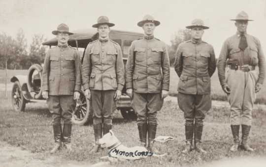 Black and white photograph of Reviewing officers at Motor Corps encampment, Fairmont, c.1918. (L to R) W.A. Curtis, Edward Karow, unidentified, unidentified, Motor Corps commander, Colonel W.A. Stephens. 
