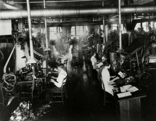 Black and white photograph of typesetting with Linotype machines at West Publishing Company, 1917.