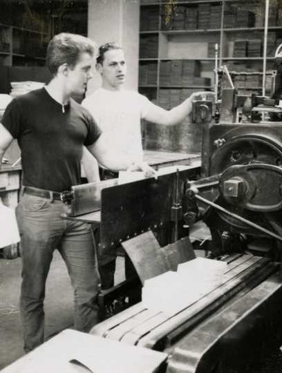 Black and white photograph of two West Publishing Company employees, c.1967. 