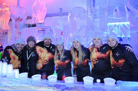 Bartenders at the Chase on the Lake Ice Bar at the International Eelpout Festival, 2017. Photo by Josh Stokes