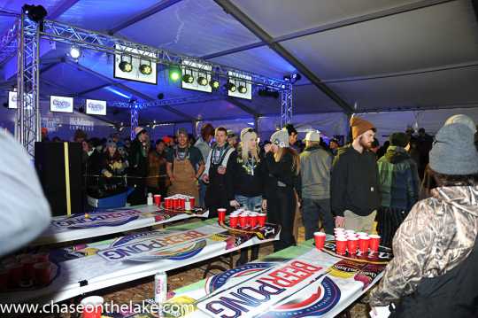 Beer pong competition at the International Eelpout Festival, 2017. A drinking game where team members tried to toss ping pong balls across the table into their competitor’s cups of beer. If successful, the opponent would have to drink the beer in the cup. Photo by Josh Stokes. 