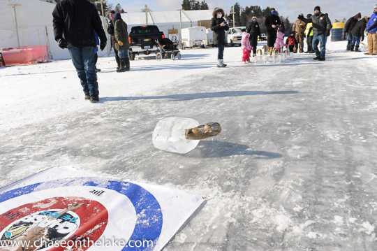 Eelpout curling competition at the International Eelpout Festival, 2015. Photo by Josh Stokes. 