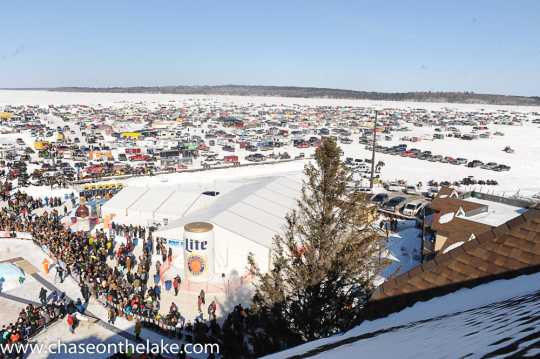 Thousands of visitors gather on Leech Lake in Walker, Minnesota for the International Eelpout Festival, ca. 2010s. Photo by Josh Stokes. © Chase on the Lake Resort, used with permission.