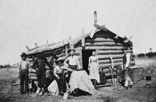 Swedish immigrants outside their cabin in Minnesota, ca. 1880. 