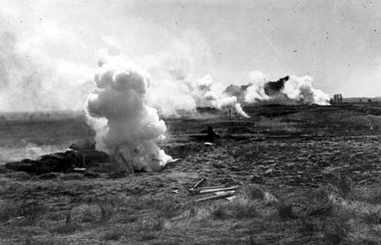Black and white photograph of mock explosions during war maneuvers at the Officers’ Training Camp, Fort Snelling, 1917. 
