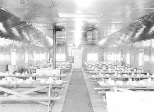 Black and white photograph of a camp dining hall, Company 707, Civilian Conservation Corps camp at Deer River, ca. 1936.