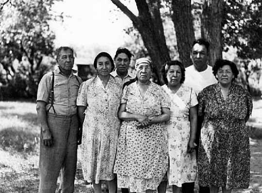 Relatives and friends of Solomon Wells (Tatanka Maza) and Mary Wells (Iha Ho Waste Win), Prairie Island. Minnesota, 1950.