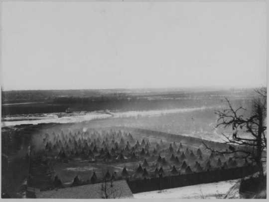 Photograph of Dakota in a concentration camp on the Minnesota River below Fort Snelling. Photographed c.1863 by Benjamin Franklin Upton.