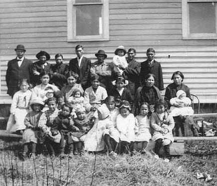 Black and white photograph of an Indian Congregation, Sawyer, Fond du Lac Reservation, 1909–1912.