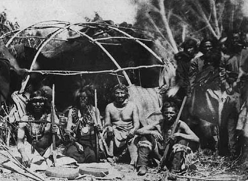 Black and white photograph of Winneshiek II (second from left) and other Ho-Chunk leaders, c.1865.