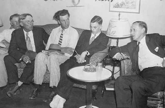 photograph of Farmer's Holiday Association representatives with Harry L. Hopkins