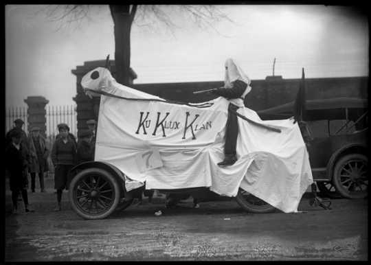 University of Minnesota Homecoming display with Ku Klux Klan banner, ca. 1923.