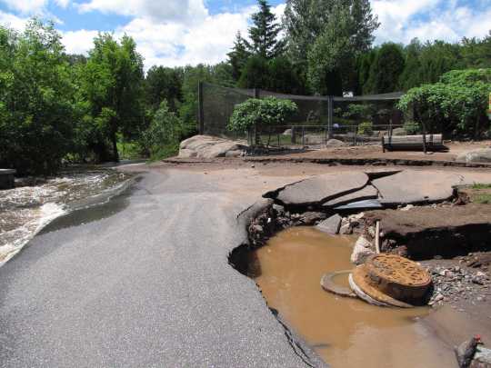 Photograph of flood damage to the Lake Superior Zoo