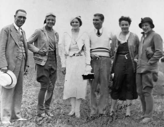 Black and white photograph of Klingensmith, second from left, at the National Air Races, at which she won the Amelia Earhart Trophy, 1932.
