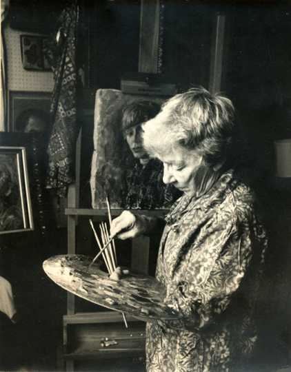 Gene Ritchie Monahan working in her studio