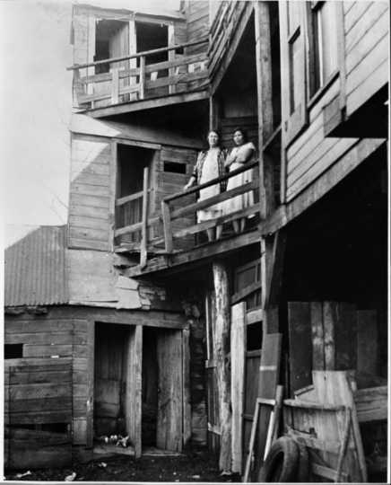 Black-and-white photograph of a three-story outhouse on State Street, c.1940.