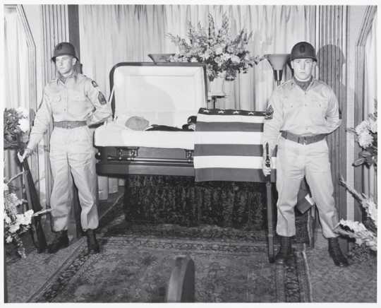 SFC Donald A. Anderson and M/Sgt. Leslie E. Kesti, both of Cloquet, members of Headquarters Battery, 257th Gun Battalion, Minnesota National Guard, serve as sentries of honor at the funeral of the late Albert Woolson (the last Grand Army of the Republic veteran) in a Duluth funeral home on August 4, 1956.