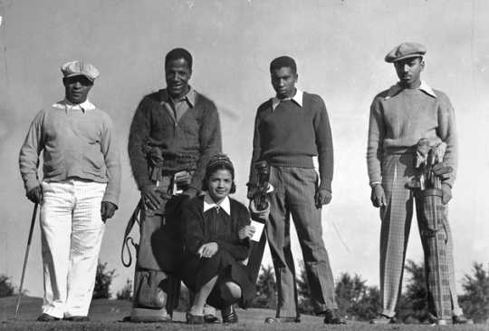 Black and white photograph of a group of golfers including Jimmie Slemmons, ca. 1938. 