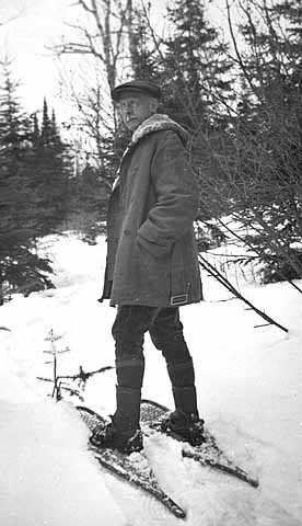 Black and white photograph of Edward Foote Waite on snowshoes, c.1945.