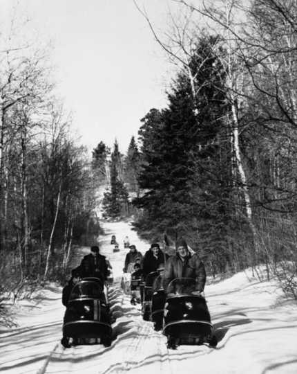 Snowmobiling in Minnesota, ca. 1970. Recreational snowmobiling has its roots in the North Star State.
