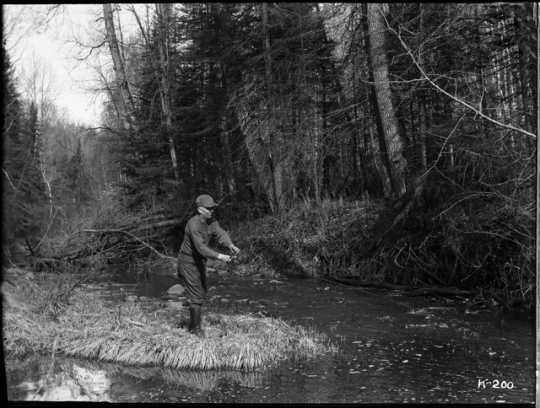 A Minnesota angler. Photograph by Kenneth Melvin Wright, ca. 1926.
