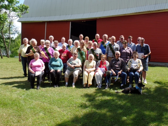 Color image of a Minnesota State Grange picnic held on the Sletton Farm in Aitkin on June 13, 2015.