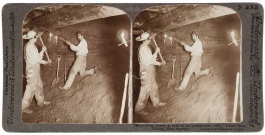 Miners at work in an underground drift in Seller Mine, Hibbing