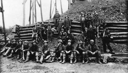 Black and white photograph of a group of miners at Ironton, 1925.