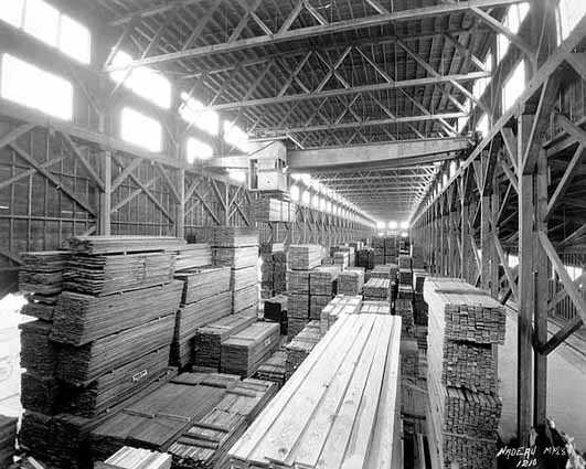 Black and white photograph of the interior of warehouse, St. Paul branch of Weyerhaeuser Company, ca. 1935.
