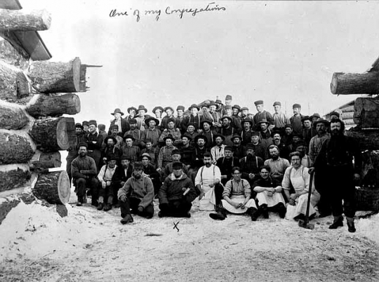 Black and white photograph of a Lumber camp crew, ca. 1915.