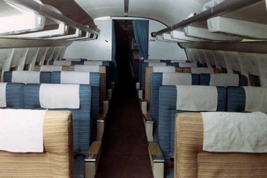 Color image of the cabin of a Northwest Airlines Boeing 727 plane, March 11, 1969.
