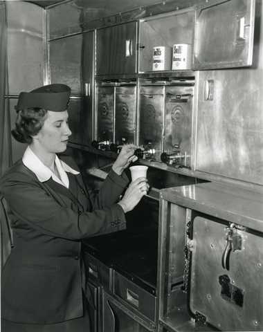 Black and white photograph of a Northwest Airlines stewardess, March 3, 1949. Photographed by Philip C. Dittes.