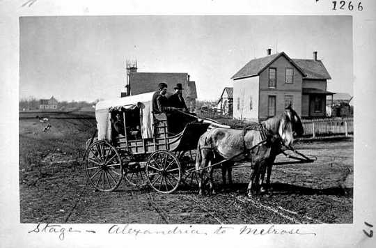 Photograph of a stagecoach bound from Alexandria to Melrose, 1876.